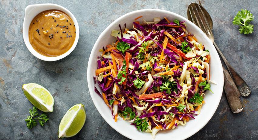 Crunchy rainbow slaw with peanut butter dressing